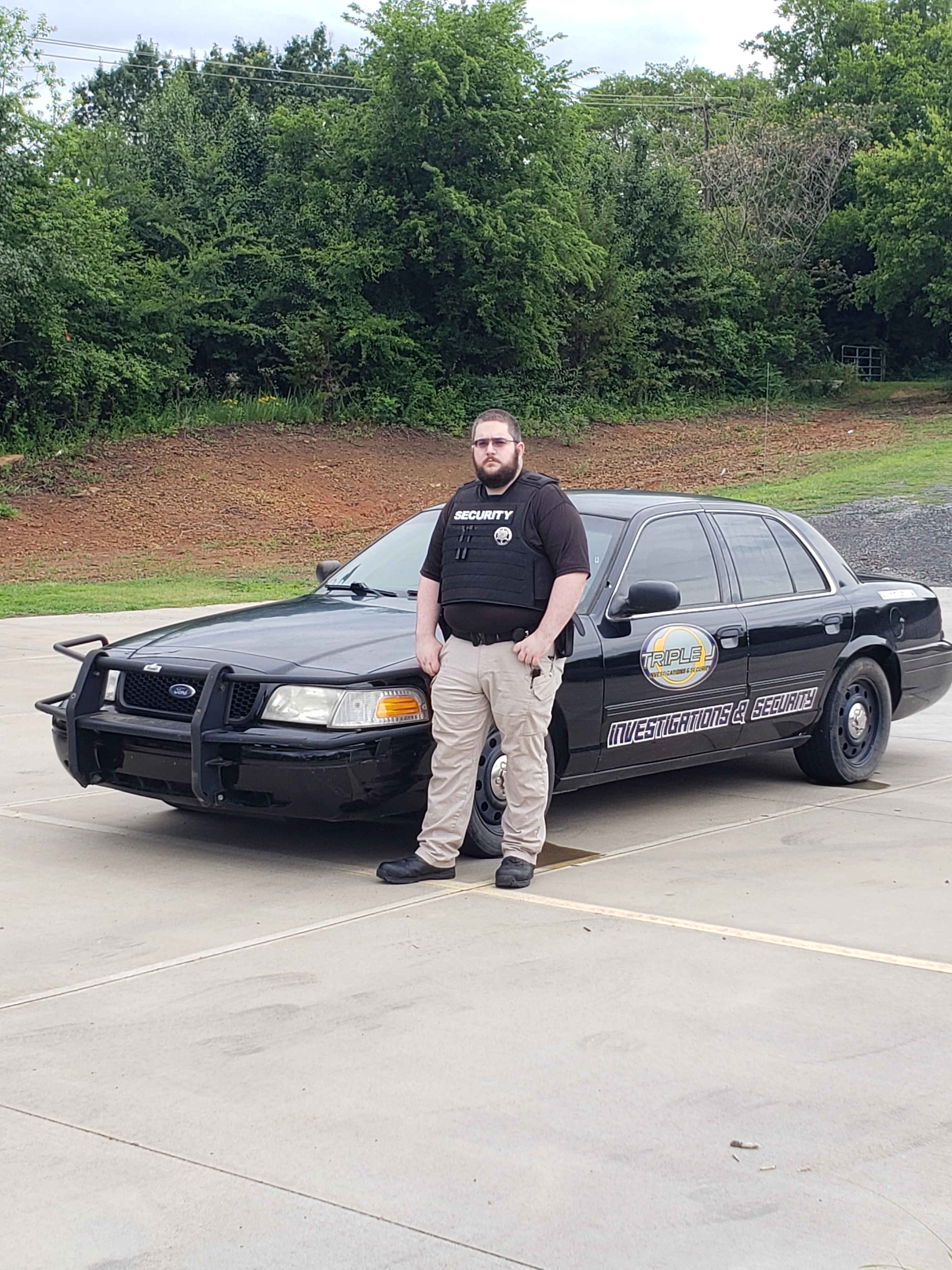 Officer Tim Garner and the patrol car
